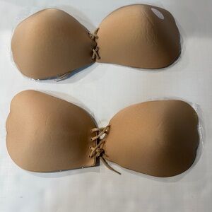 2 Seamless Tan Lace-Up Strapless Bras. One DDD, one F